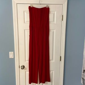 Size Large. Red Strapless Jumpsuit with Pockets.